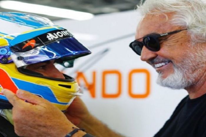 Flavio Briatore (kanan) saat masih aktif di dunia F1 sebagai bos tim Renault.