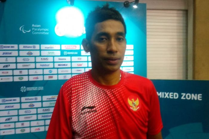 Atlet tenis meja disabilitas andalan Indonesia, David Jacobs, saat ditemui awak media di area mixed zone Ecovention Ancol, Jakarta, Selasa (9/10/2018).