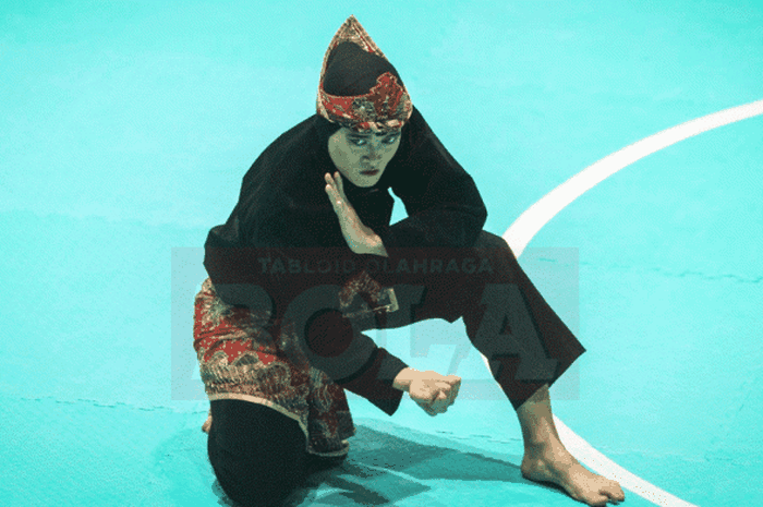 Aksi Puspa Arumsari di Padepokan Pencak Silat TMII berujung medali emas ke-13 bagi Indonesia pada Asian Games 2018, 27 Agustus 2018. 