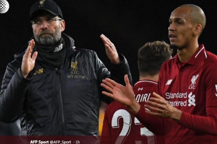 Reaksi pelatih Liverpool, Juergen Klopp (kiri), dan gelandang Fabinho selepas laga Piala FA lawan Wolverhampton Wanderers di Molineux Stadium, 7 Januari 2019.