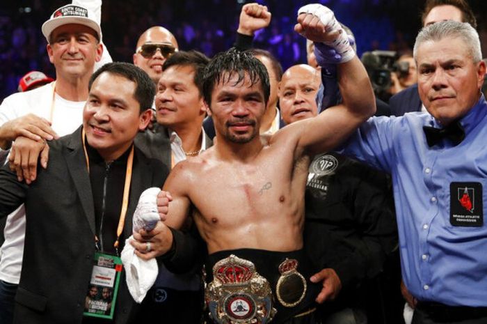 Manny Pacquiao berhasil mempertahankan gelar juara WBA kelas welter setelah menang atas Adrien Broner di MGM Grand, Las Vegas, Minggu (20/1/2019) WIB.