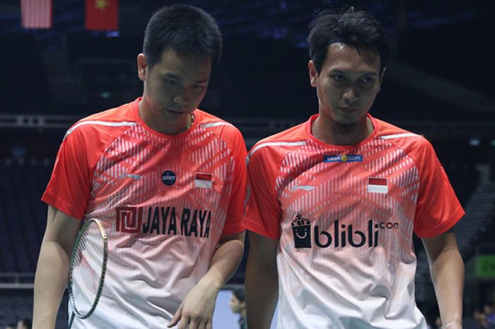 Pasangan ganda putra, Mohammad Ahsan/Hendra Setiawan saat tampil pada ajang Singapore Open 2018 di Singapore Indoor Stadium, Singapura, Rabu (18/7/2018).