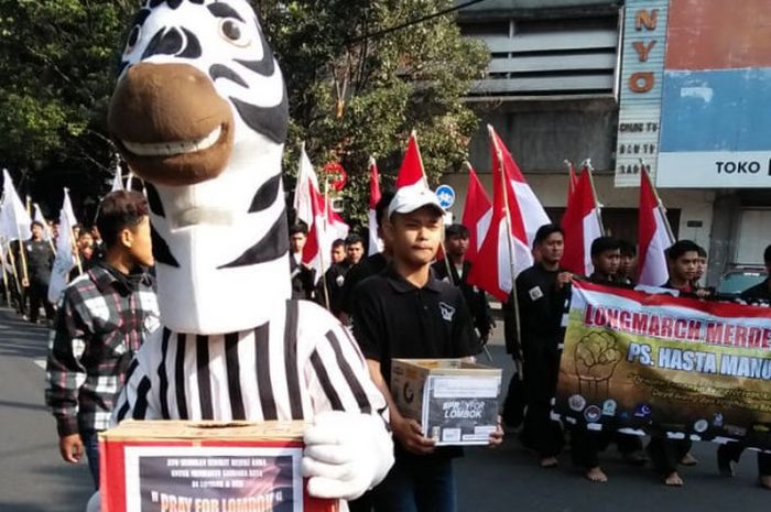 JCI Chapter Solo menggelar acara penggalangan dana untuk korban gempa di Lombok pada acara CFD, Minggu (12/8/2018).