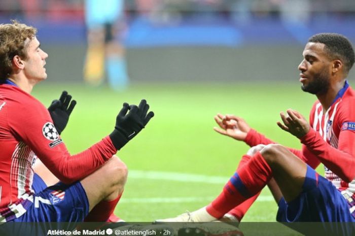 Ekspresi penyerang Atletico Madrid, Antoine Griezmann (kiri), dalam laga Grup A Liga Champions melawan AS Monaco di Stadion Wanda Metropolitano, Madrid, Spanyol pada 28 November 2018.