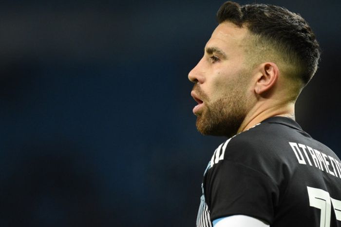 Ekspresi bek Argentina, Nicolas Otamendi pada laga persahabatan melawan Italia di Stadion Etihad, Jumat (23/3/2018) waktu setempat. 