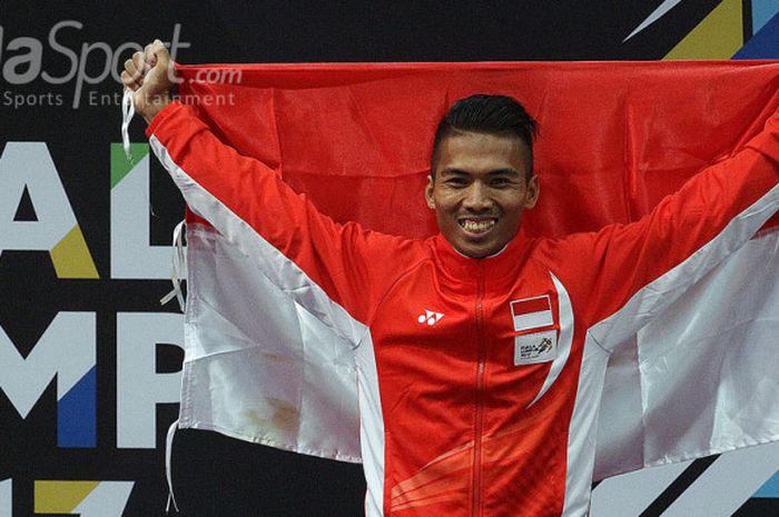 Atlet angkat besi Indonesia, Deni, saat tampil di nomor angkat besi kelas 69 Kg pada SEA Games 2017 di Mitec, Kuala Lumpur, Malaysia, Selasa (29/8/2017)/