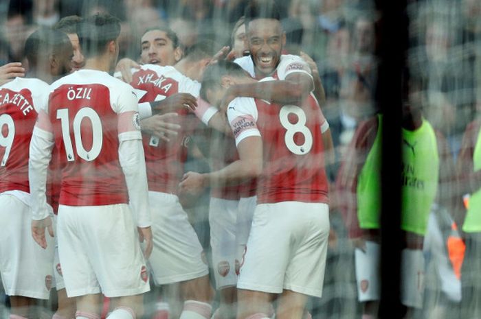 Pemain Arsenal melakukan selebrasi setelah berhasil memastikan kemenangan 2-0 atas Everton di Stadion  Emirates, Minggu (23/9/2018) malam WIB.