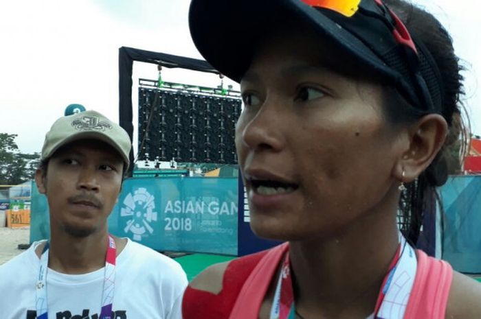 Pevoli pantai putri Indonesia, Putu Dini Jasita Utami, ketika memberi keterangan pers usai penyisihan hari Kamis (23/8/2018) di Volleybeach Arena Jakabaring, Palembang. Sumatra Selatan.