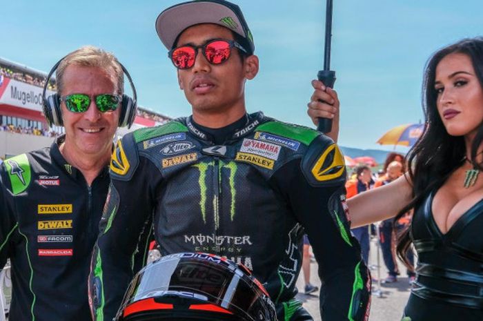 Pebalap Yamaha Tech3, Hafizh Syahrin, saat berada di baris start sebelum balapan MotoGP Italia di Sirkuit Mugello, Italia, Minggu (6/6/2018).