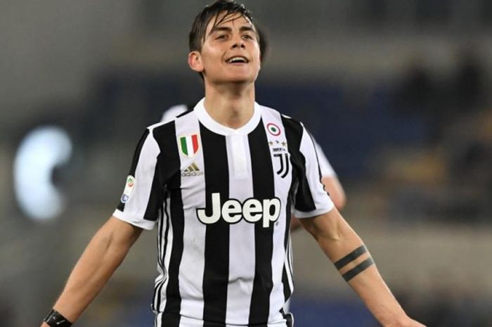    Reaksi Paulo Dybala setelah mencetak gol kemenangan Juventus ke gawang Lazio daam partai Liga Italia di Olimpico, Roma, 3 Maret 2018.   