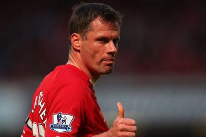 Jamie Carragher saat masih memperkuat Liverpool dalam laga EPL kontra QPR di Stadion Anfield pada 19 Mei 2013.