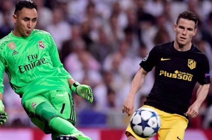 Kiper Real Madrid, Keylor Navas (kiri), mengontrol bola sambil dibayangi oleh striker Atletico Madrid, Kevin Gameiro, dalam partai Liga Champions di Santiago Bernabeu, Madrid, 2 Mei 2017.