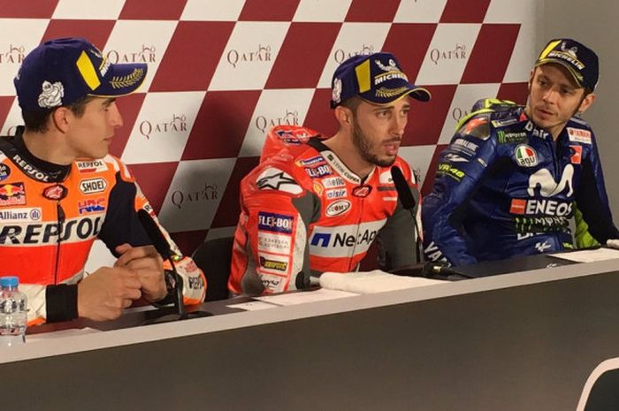 Marc Marquez, Andrea Dovizioso, dan Valentino Rossi, saat jumpa pers usai balapan MotoGP Qatar, Minggu (18/3/2018).