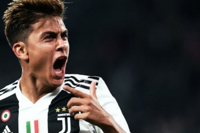 Striker Juventus Paulo Dybala, tampak senang bukan kepalang usai mencetak gol ke gawang Bologna dalam lanjutan laga Liga Italia Serie A yang berlangsung di Stadion Allianz, Turin, Italia, pada 26 September 2018.