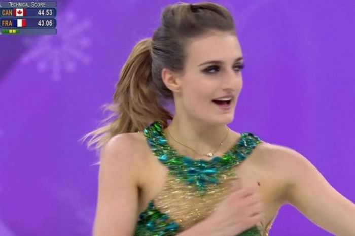 Atlet figure skating asal Prancis, Gabriella Papadakis saat tampil pada ajang Olimpiade Musim Dingin 2018, Senin (19/2/2018).