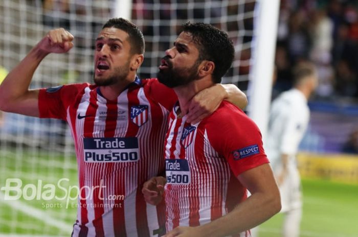 Pemain Atletico Madrid, Koke dan Diego Costa, merayakan gol pada pertandingan Piala Super Eropa 2018 melawan Real Madrid, 15 Agustus 2018 di Talinn, Estonia.