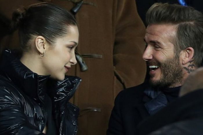 David Beckham (kanan) dan Bella Hadid (kiri) menonton pertandingan antara Real Madrid dan Paris Saint Germain di Stadion Parc des Princes, Selasa (6/3/2018) atau Rabu dini hari WIB.	