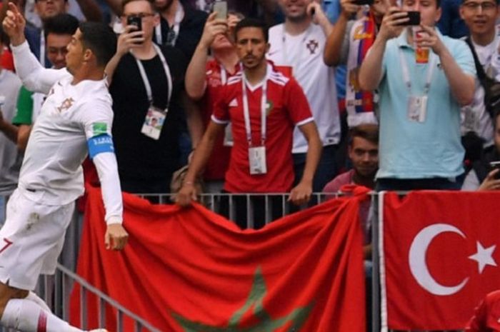 Kapten Portugal, Cristiano Ronaldo, merayakan golnya ke gawang Maroko pada pertandingan Grup B Piala Dunia 2018 di Stadion Luzhniki, 20 Juni 2018. 