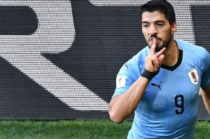 Gaya Luis Suarez ketika merayakan gol Uruguay ke gawang Arab Saudi pada laga Grup A Piala Dunia 2018 di Rostov Arena, 19 Juni 2018. 