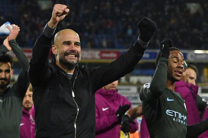 Kebahagiaan pelatih Manchester City, Pep Guardiola, seusai menang atas Tottenham Hotspur dalam partai Liga Inggris di Stadion Wembley, Sabtu (14/4/2018)