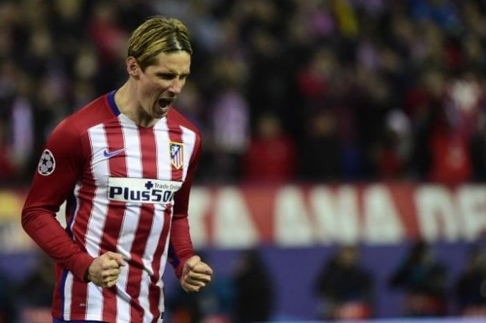  Penyerang Atletico Madrid, Fernando Torres, merayakan keberhasilan timnya menaklukkan PSV Eindhoven dalam laga leg kedua babak 16 besar Liga Champions di Stadion Vicente Calderon, Madrid, 15 Maret 2016. 