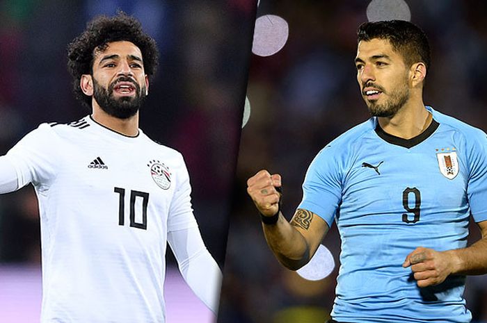 Mohamed Salah (kiri/Mesir) adu tajam dengan Luis Suarez (Uruguay).