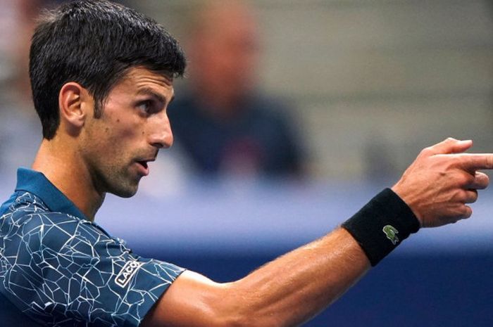 Ekspresi Novak Djokovic saat melakoni laga perempat final US Open 2018 kontra John Millman pada Rabu (5/9/2018) malam waktu Amerika Serikat.