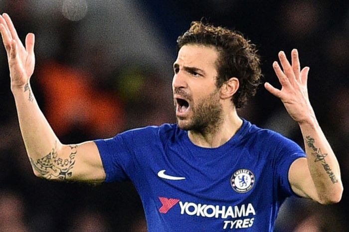         Ekspresi mantan gelandang Chelsea, Cesc Fabregas, dalam laga leg pertama babak 16 besar Liga Champi