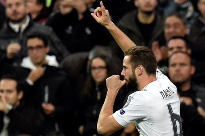 Pemain belakang Real Madrid, Nacho Fernandez, merayakan golnya ke gawang Paris Saint-Germain pada partai fase grup Liga Champions di Stadion Santiago Bernabeu, 3 November 2015.