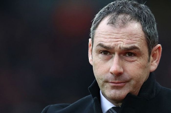 Ekspresi manajer Swansea City, Paul Clement, dalam pertandingan Premier League 2016-2017 menghadapi Liverpool di Stadion Anfield, Liverpool, Inggris, pada Sabtu (21/1/2017).