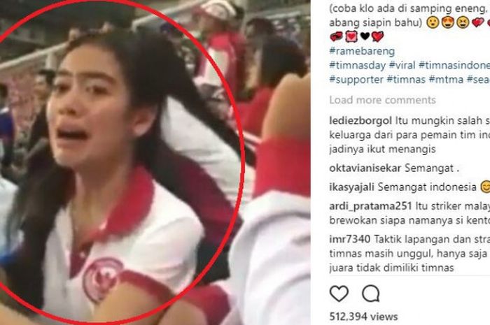 pendukung wanita cantik yang menangis di Stadion