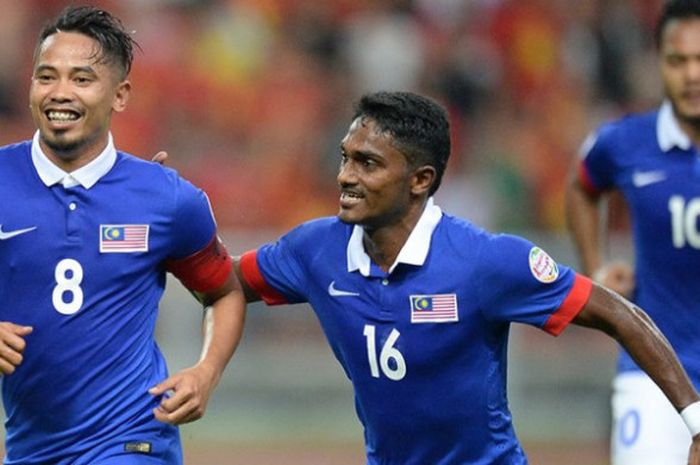 Gelandang Safiq Rahim (kiri) saat membela timnas Malaysia. 