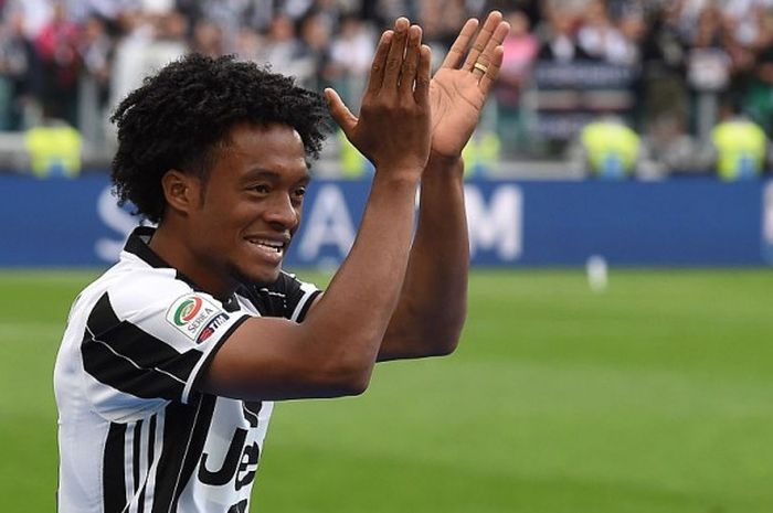 Juan Cuadrado merayakan kemenangan Juventus atas Sampdoria dalam laga Serie A di Juventus Arena, 14 Mei 2016.