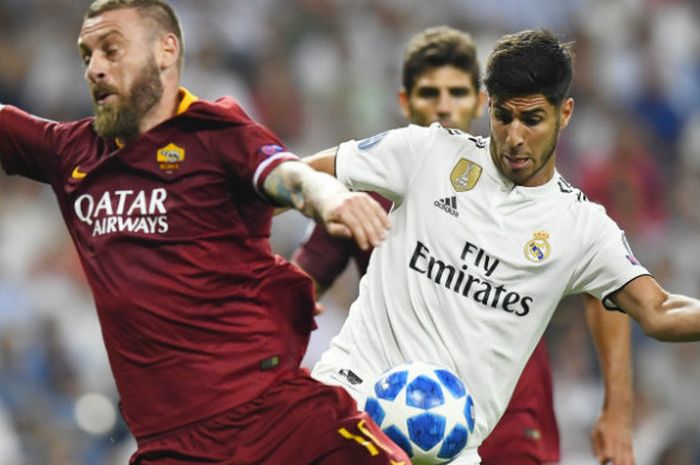 Aksi gelandang Real Madrid, Marco Asensio, dalam laga LIga Champions melawan AS Roma di Santiago Bernabeu, Rabu (19/9/2018)