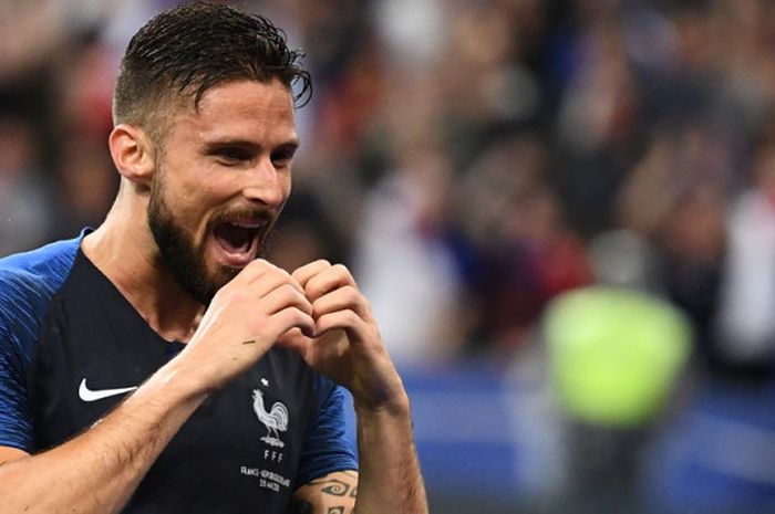 Selebrasi striker tim nasional Prancis, Olivier Giroud, seusai membobol gawang Republik Irlandia dalam laga uji coba di Stadion Stade de France, Paris, Prancis, pada Senin (28/5/2018).