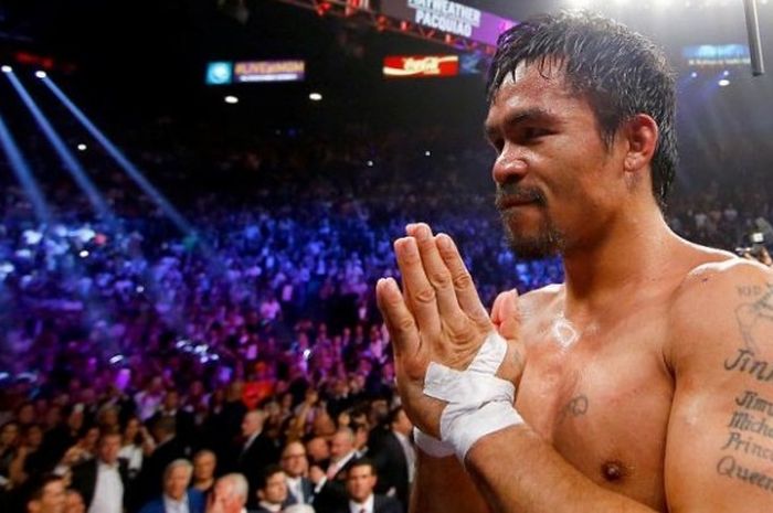 Manny Pacquiao, menyapa penonton setelah kalah dari Floyd Mayweather Jr. dalam laga unifikasi kelas welter di MGM Grand Garden Arena, Las Vegas, AS, pada 2 Mei 2015.