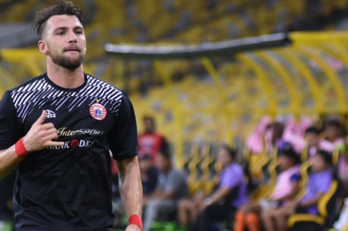 Selebrasi striker Persija, Marko Simic seusai mencetak gol ke gawang Ratchaburi FC pada laga perdana turnamen pra-musim Boost SportsFix Super Cup 2018 di Stadion Nasional Malaysia, Kuala Lumpur, Sabtu (13/1/2018) malam. 