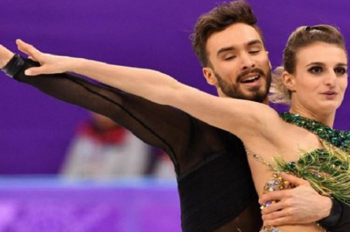 Atlet figure skating Prancis, Gabriella Papadakis (kanan) dan Guillaume Cizeron (kiri) saat tampil pada ajang Olimpiade Musim Dingin 2018 di nomor ice dance, Senin (19/2/2018).