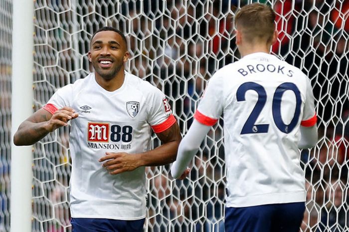 Penyerang Bournemouth, Callum Wilson, melakukan selebrasi setelah mencetak gol ke gawang Watford di Vicarade Road, Sabtu (6/10/2018) malam WIB.