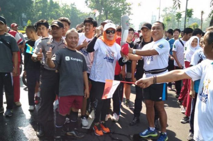 Area perkantoran Kompas Gramedia Palmerah Barat dan Selatan, serta Menara Kompas turut menjadi rute estafet Jelang Obor Asian Games wilayah Kelurahan Gelora