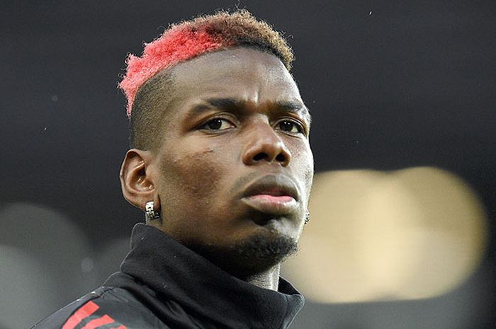   Ekspresi gelandang Manchester United, Paul Pogba, saat melakukan pemanasan mejelang laga melawan Basel pada ajang Liga Champions 2017-2018 Grup A di Stadion Old Trafford, Manchester, Inggris, ada 12 September 2017.  