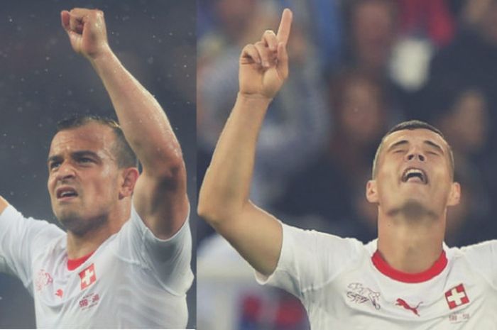 Selebrasi pemain timnas Swiss, Xherdan Shaqiri (kiri) dan Granit Xhaka (kanan), kala mencetak gol ke gawang Serbia pada matchday kedua grup E Piala Dunia 2018, Jumat (22/6/2018).