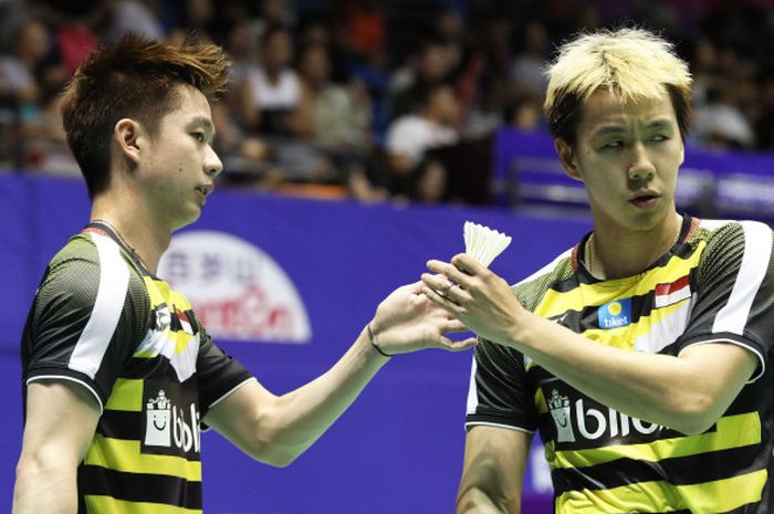 Marcus Fernaldi Gideon (kanan) dan Kevin Sanjaya Sukamuljo (kiri) saat melakoni laga babak pertama China Open 2018 yang berlangsung Rabu (19/9/2018).