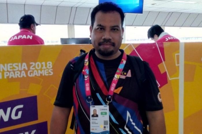 Salah satu atlet menembak Malaysia yang akan tampil pada Asian Para Games 2018 berpose di lapangan tembak, Senayan, Jakarta, Sabtu (6/10/2018).