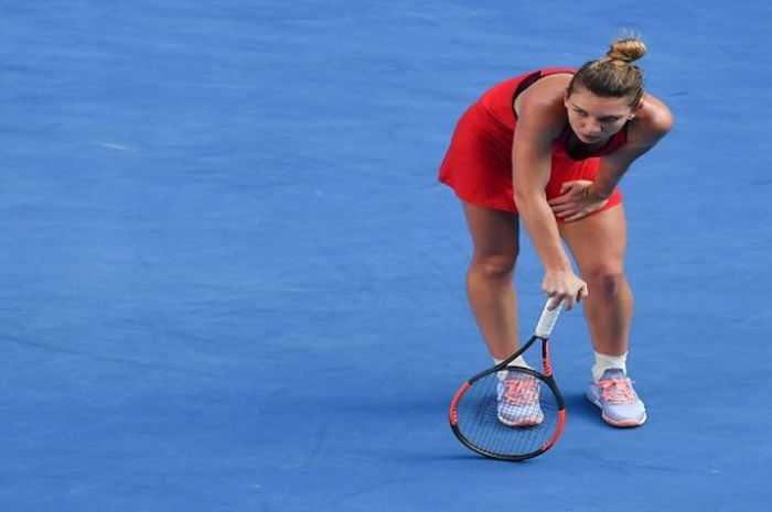 Simona Halep saat menjalani laga sengit melawan Angelique Kerber pada partai semifinal Australian Open 2018, Kamis (25/1/2018).