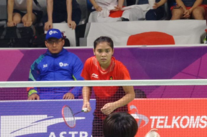 Pebulu tangkis tunggal putri Indonesia, Gregoria Mariska Tunjung, saat berhadapan dengan Akane Yamaguchi (Jepang), pada laga beregu putri Asian Games 2018, di Istora Senayan, Jakarta, Selasa (21/8/2018) siang.