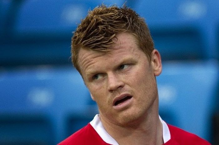 Bek kiri asal Norwegia, John Arne Riise, saat tampil pada sebuah laga uji coba melawan Lithuania di Oslo, 7 Juni 2011. 