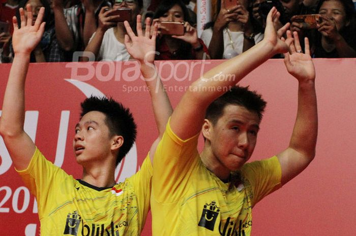 Pasangan ganda putra Indonesia, Marcus Fernaldi Gideon/Kevin Sanjaya Sukamuljo, pada final Indonesia Masters 2018 di Istora Senayan, Jakarta, Minggu (28/1/2018).