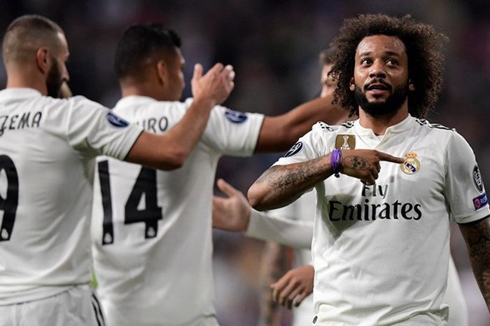 Bek Real Madrid, Marcelo (kanan), merayakan gol yang dicetak ke gawang Viktoria Plzen dalam laga Grup G Liga Champions di Stadion Santiago Bernabeu, Madrid, Spanyol pada 23 Oktober 2018.