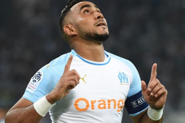 Reaksi Dimitri Payet setelah mencetak gol Olympique Marseille ke gawang Toulouse pada laga Liga Prancis